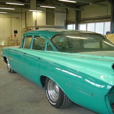 Oldsmobile 1959 in türkis von der Seite